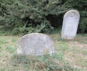 The lettering on this small headstone is still intact. Photo September 2016.