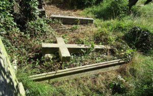 The cross now rests on the small rough cut block that once supported it. July 2016